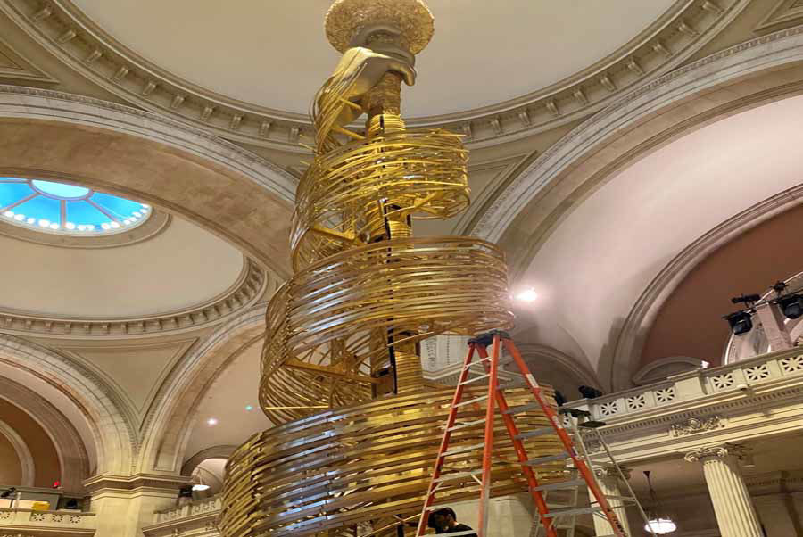 Spiral Staircase Leads to Statue of Liberty's Eternal Flame of Enlightenment Centerpiece at Met Gala